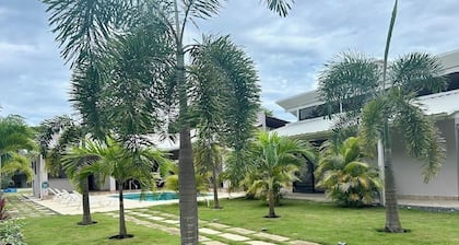 Charming studio steps from the beach with access to pool and outdoor spaces