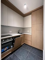 Microwave, dishwasher, cookware/dishes/utensils