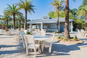 Outdoor dining - GREAT 1-BR condo, bunk beds, balcony, gym, lazy river pool oasis at the Wharf! (Orange Beach)