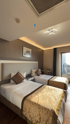 Chambre avec lits jumeaux | Accès au Wi-Fi (inclus)