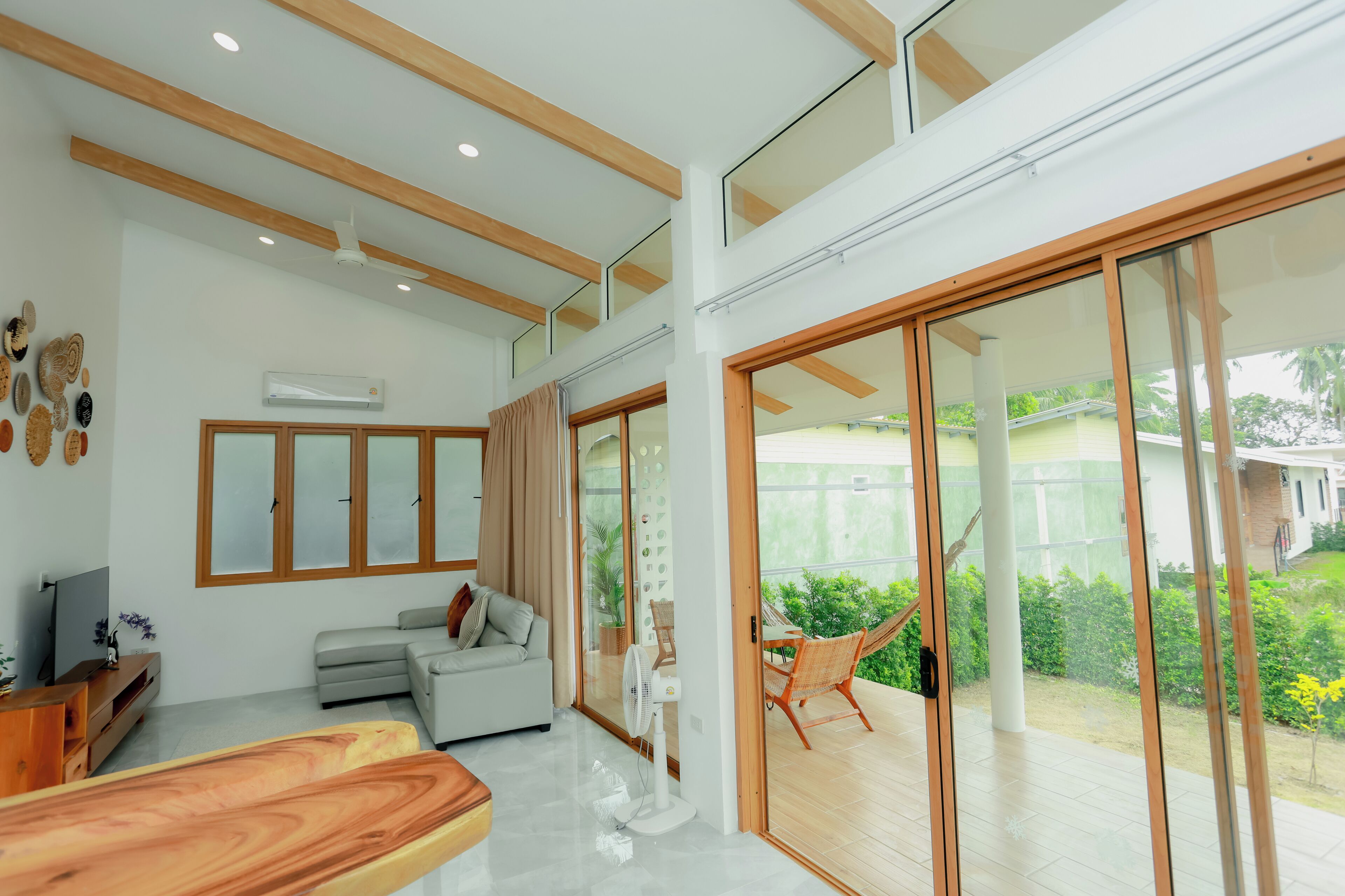 Superior Villa | Living area | 50-inch Smart TV with digital channels