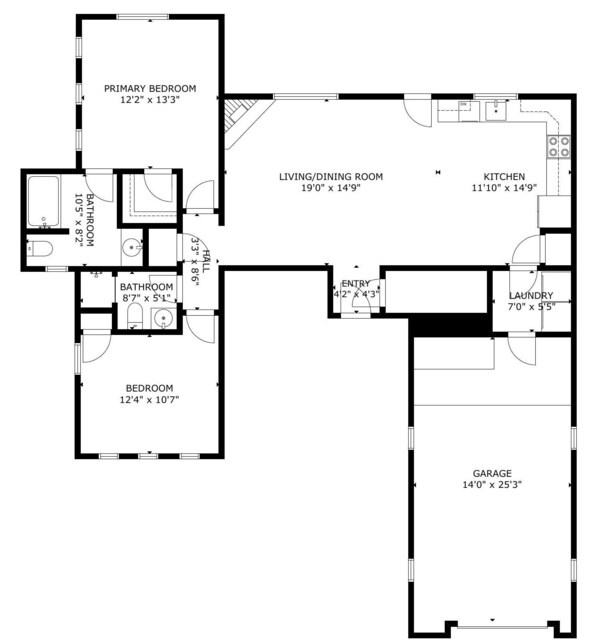 A floor plan with a primary bedroom, two bathrooms, a living/dining room, kitchen, laundry, and a garage.