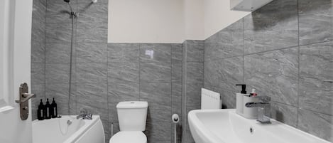 Hair dryer, towels, soap, shampoo