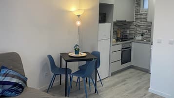 Comfort Apartment, Kitchenette, River View | Living area