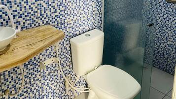 Family Triple Room | Bathroom | Shower, towels, soap, toilet paper