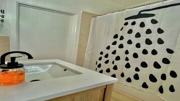 Hair dryer, towels, soap, toilet paper