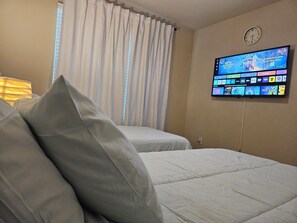 4 habitaciones, tabla de planchar con plancha, wifi y ropa de cama 
