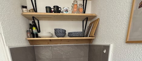 Fridge, microwave, stovetop, coffee/tea maker