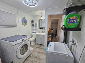 Hair dryer, towels, soap, shampoo