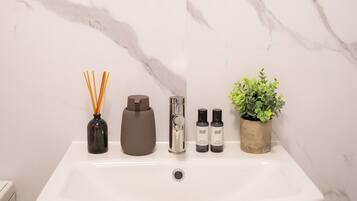 Hair dryer, towels, soap, toilet paper