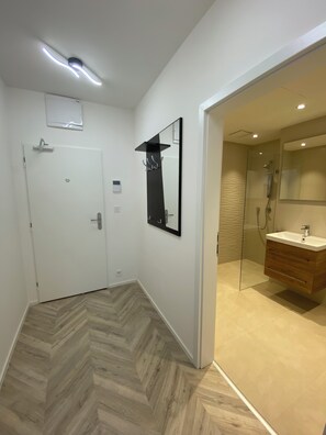Shower, towels, soap, toilet paper