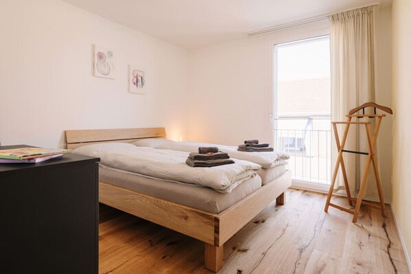 2 bedrooms, desk, iron/ironing board, travel cot