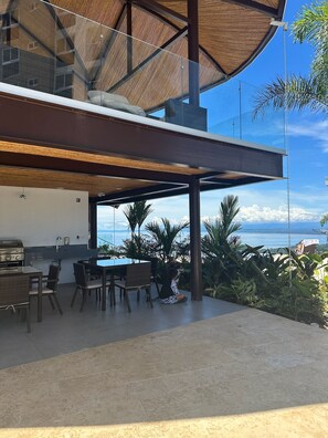 Outdoor dining - Brand New Luxe Condo - Amazing Ocean & Jungle Views (Parrita)