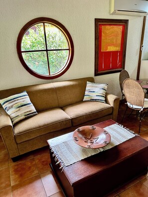 Living area - Riverside oasis with private pool and backyard. Walking distance to the beach. (Paquera)