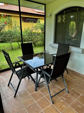 Outdoor dining - Riverside oasis with private pool and backyard.  Walking distance to the beach. (Paquera)