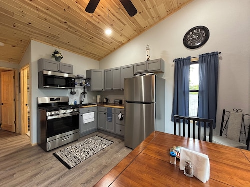 Enchanting chalet- 2 bedroom-2 bath, sleeps 8. Beautiful views of Hubbard Lake.