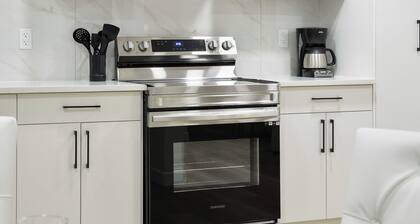 Modern & Elegant Executive Suite near Refinery Row. Office Desk + Kitchen