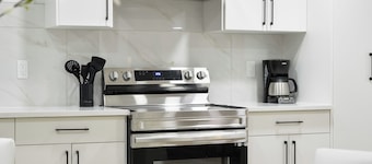 Modern & Elegant Executive Suite near Refinery Row. Office Desk + Kitchen