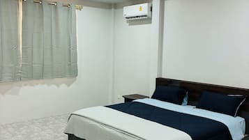 Biệt thự Deluxe, quang cảnh vườn | Bộ đồ giường cao cấp, bàn, khu vực làm việc phù hợp cho laptop