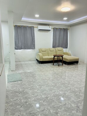 Deluxe Villa, Garden View | Living area | Toys