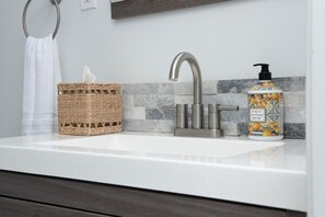 Hair dryer, towels, soap, shampoo