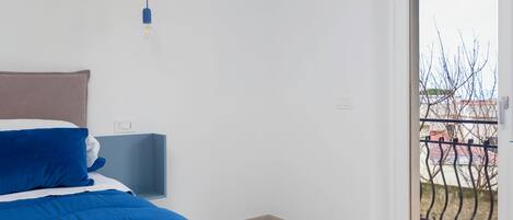 Design Apartment, Balcony, City View | Blackout drapes, iron/ironing board, free WiFi