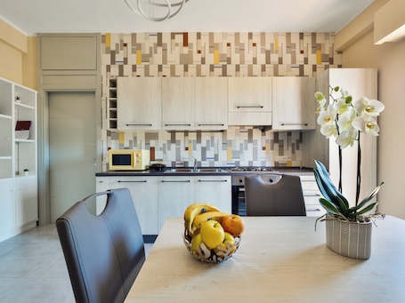 Comfort Apartment, Balcony | Private kitchen | Fridge, microwave, oven, stovetop