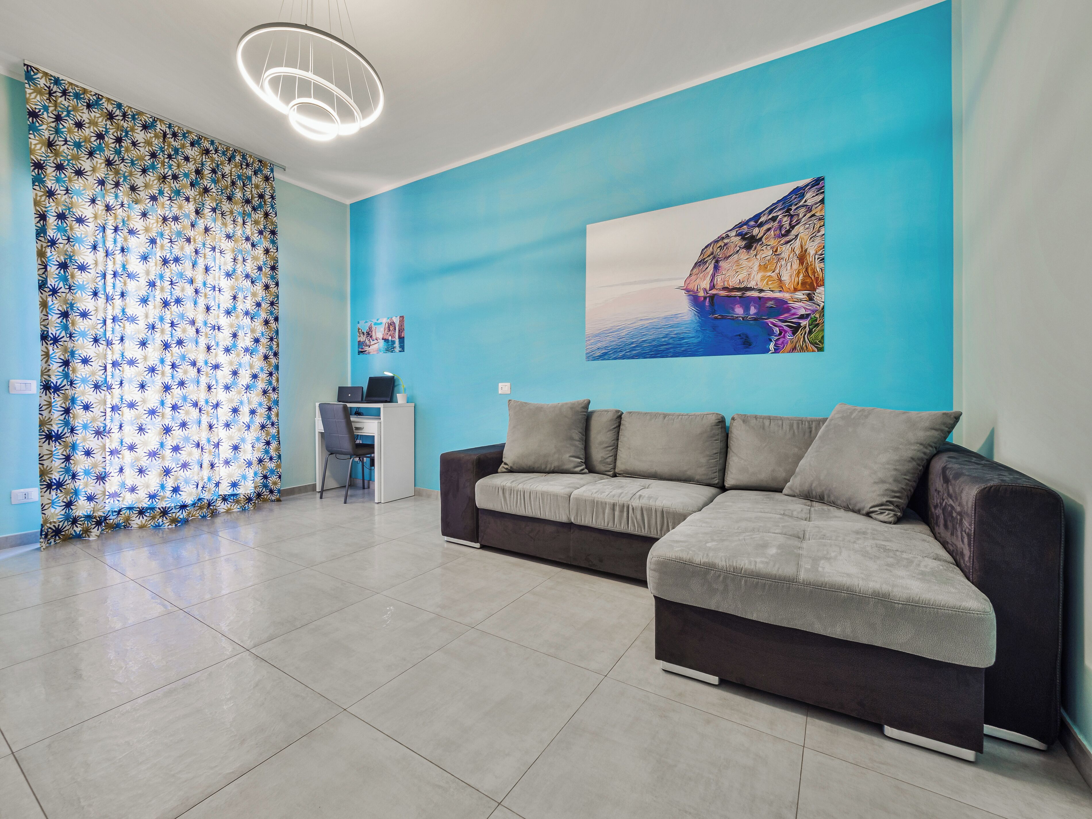 Comfort Apartment, Balcony | Living area | 50-inch flat-screen TV with digital channels, video-game console