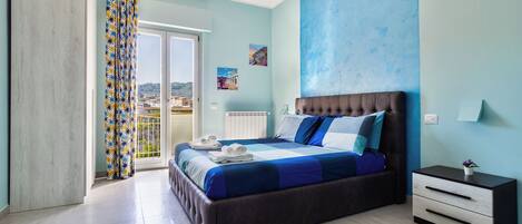 Comfort Apartment, Balcony | Desk, laptop workspace, blackout drapes, iron/ironing board