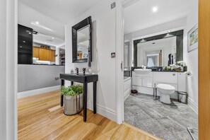 Shower, towels, soap, toilet paper