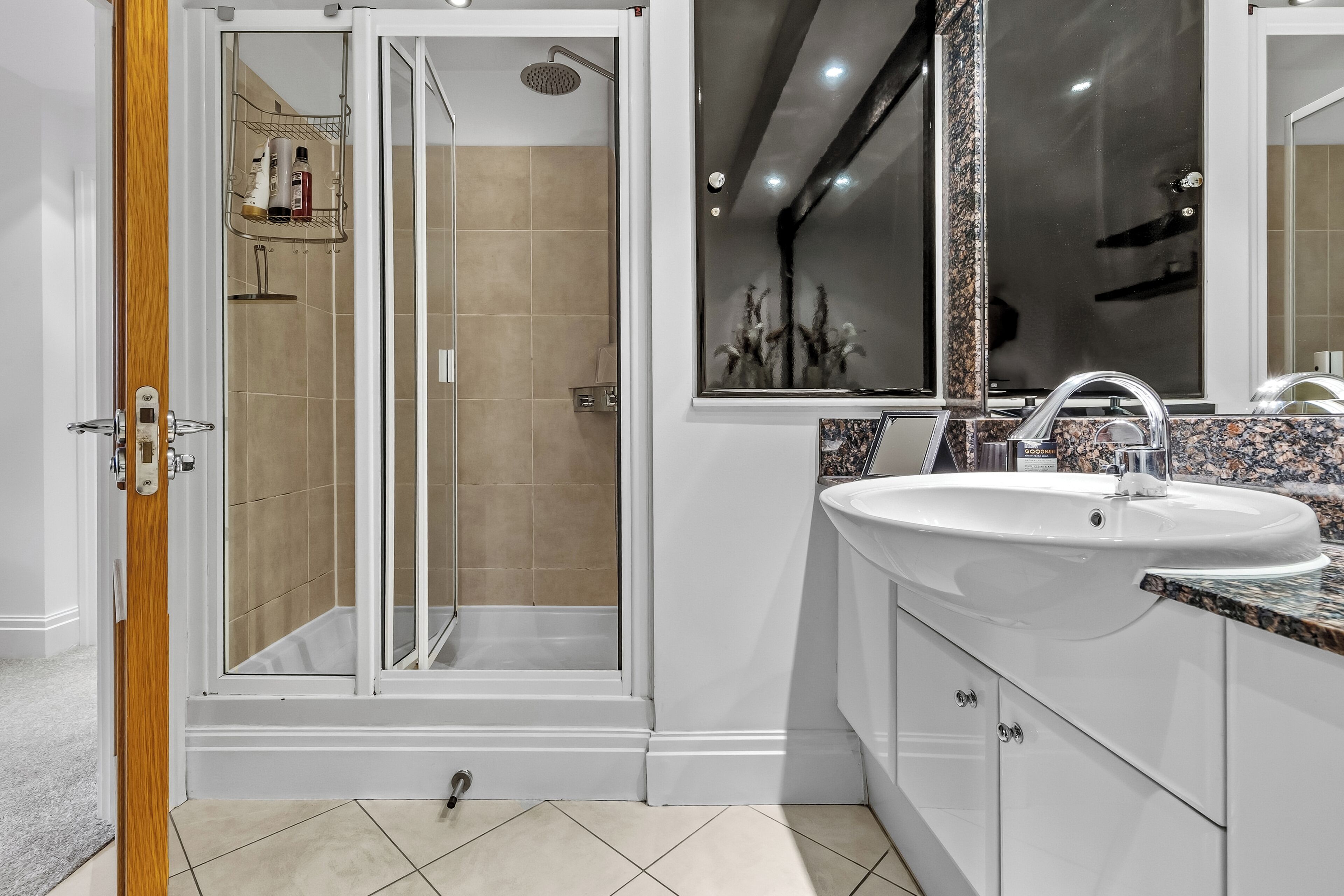 Shower, towels, soap, toilet paper