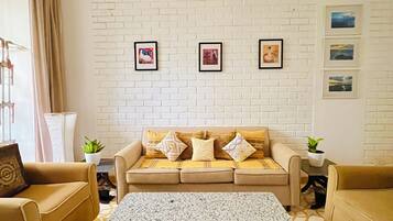 Appartement, vue jardin | Coin séjour