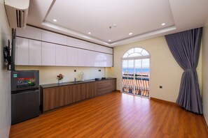 Familiesuite, byutsikt | Eget kjøkken