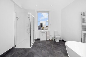 Shower, hair dryer, towels, soap