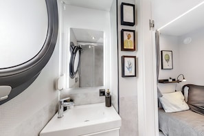 Eco-friendly toiletries, hair dryer, towels, soap