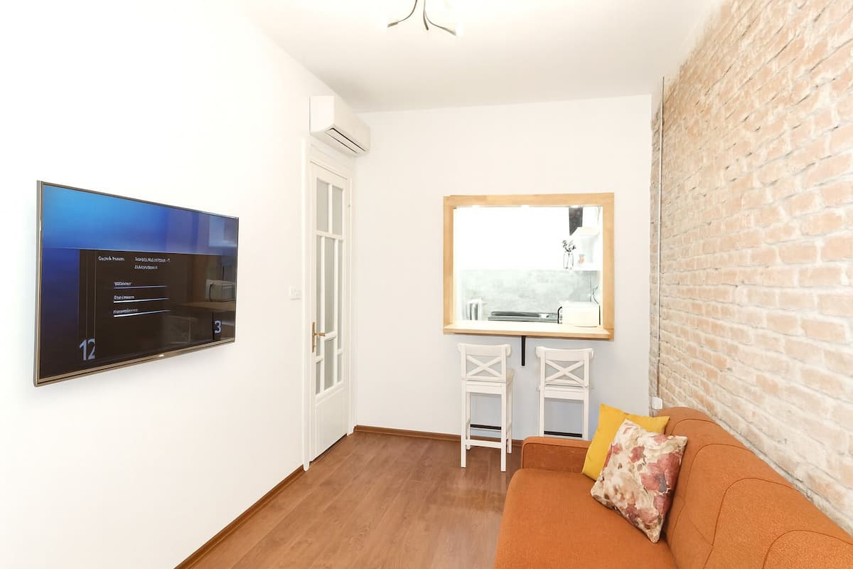 Deluxe-Suite | Minibar, Zimmersafe, individuell dekoriert, individuell eingerichtet