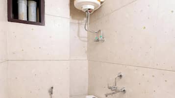 Shower, rainfall showerhead, slippers, towels