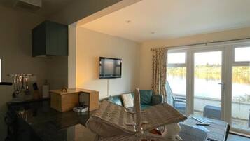 Apartment, Lake View | Living area | Toys, printers