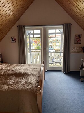 2 habitaciones, tabla de planchar con plancha, cuna de viaje y wifi