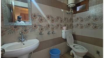 Deluxe Double Room, Multiple Beds | Bathroom | Shower, rainfall showerhead, slippers, towels