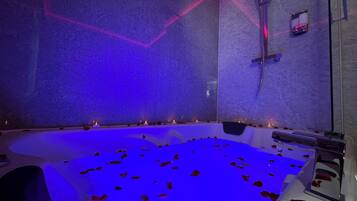 Jetted tub, hair dryer, towels, soap