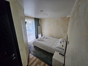 Comfort Double Room, City View | In-room safe, blackout drapes, iron/ironing board, free WiFi