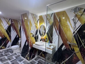 Superior Double Room, Partial Ocean View | Bathroom | Shower, hair dryer, slippers, towels