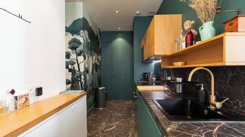 Apartment | Private kitchen | Cleaning supplies