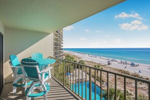 Outdoor dining - Gulf-Front 5th Floor 2BR 2BA Condo, Modern Coastal Comfort w/ Beach Chairs!! (Panama City Beach)