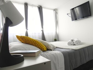 1 غرفة نوم ومكواة/لوح كي وواي فاي وملاءات أسرّة