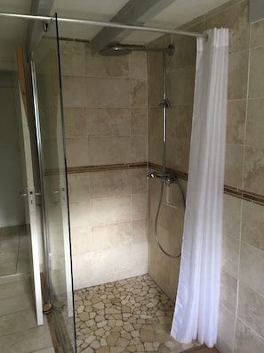 Shower, hair dryer, towels, toilet paper