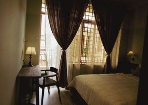 Comfort House, 4 Bedrooms, Private Bathroom, Beachside | Desk, laptop workspace, blackout drapes, iron/ironing board - Brenda Home (Nha Trang)