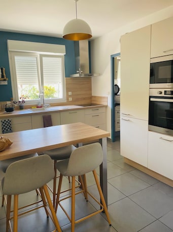 Fridge, microwave, oven, stovetop. La Maison Jaune - 4 bedrooms - sleeps 7 - Quiet location