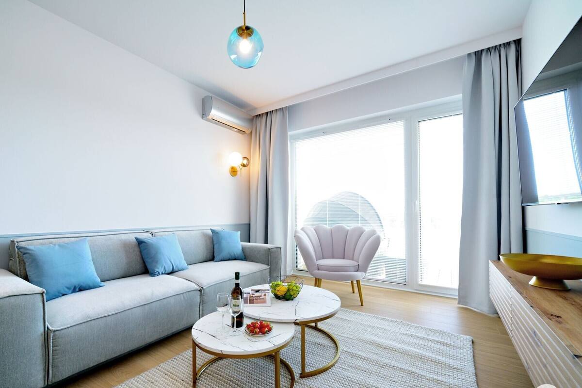 Classic Apartment, Park View (D406) | Living area | 40-inch Smart TV with digital channels